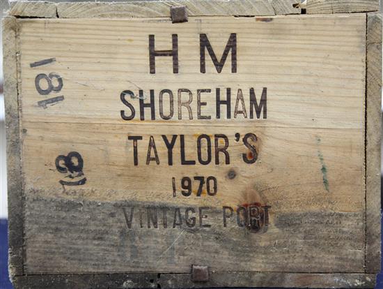 A case of twelve Taylors 1970 vintage port in original wooden case.